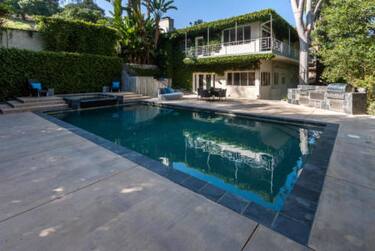 MAVRIXONLINE.COM - WORLDWIDE - Movie star and pop icon Jared Leto is selling this $1.9 million vine-covered 1955 Mid Century era home located in the Hollywood Hills.  The 4 bedroom, 3 bathroom, 4021 sq ft property is private and secluded and the home offers two very large master suites with incredible closet space plus two guest rooms. A spacious living room with fireplace, eat-in kitchen, dining room plus oversized family room with wet bar and adjacent music studio are also offered. The magical and sprawling resort like grounds have multiple entertaining areas with mature, tropical landscaping, a fabulous lagoon style pool and spa, outdoor living room with BBQ/kitchen, grassy yard and fire pit.   Leto has since moved on up with a $5 million purchase of the so-called 'Lookout Mountain Laboratory’ a Former Military Compound  in Laurel Canyon that boats 8 bedrooms, 12 bathrooms, galleries, a theater, a soundstage, pool, and waterfall. This property is listed with Brian Courville/Modern Living LA.  Los Angeles, CA 4th April 2017Byline, credit, TV usage, web usage or linkback must read MAVRIXONLINE.COM.Failure to byline correctly will incur double the agreed fee.Tel: +1 305 542 9275.