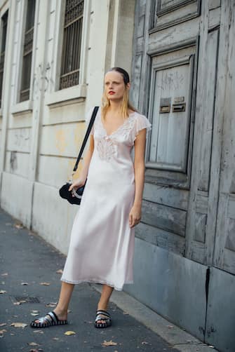 MILAN, ITALY - SEPTEMBER 23:  Model Hanne Gaby Odiele in a light pink white slip dress after the Marni show during Milan Fashion Week Spring/Summer 2019 on September 23, 2018 in Milan, Italy.