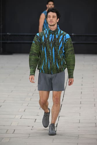 PARIS, FRANCE - JUNE 23: A model walks the runway during the Iseey Miyake Ready to Wear Spring/Summer 2023 fashion show as part of the Paris Men Fashion Week on June 23, 2022 in Paris, France. (Photo by Victor VIRGILE/Gamma-Rapho via Getty Images)