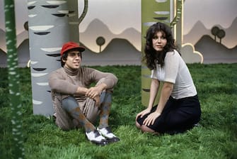 Italian singer Adriano Celentano and his wife Claudia Mori (Claudia Moroni) sitting on the set of a TV show. 1972  (Photo by Marcello Salustri\Mondadori via Getty Images)