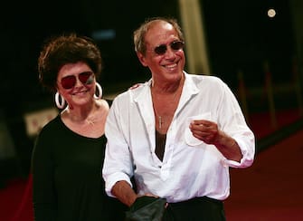 VENICE, ITALY - SEPTEMBER 04:  Director and actor Adriano Celentano with his wife Claudia Mori attend the 'Yuppi Du' premiere during the 65th Venice Film Festival on September 4, 2008 in Venice, Italy.  (Photo by Elisabetta A. Villa/WireImage)