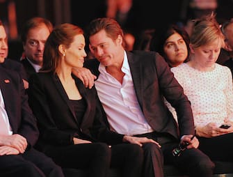 LONDON, ENGLAND - JUNE 12:  UN Special Envoy and actress Angelina Jolie with Brad Pitt at the Global Summit to End Sexual Violence in Conflict at ExCel on June 12, 2014 in London, England. The four-day conference on sexual violence in war is hosted by Foreign Secretary William Hague and UN Special Envoy and actress Angelina Jolie.  (Photo by Eamonn McCormack/WireImage)