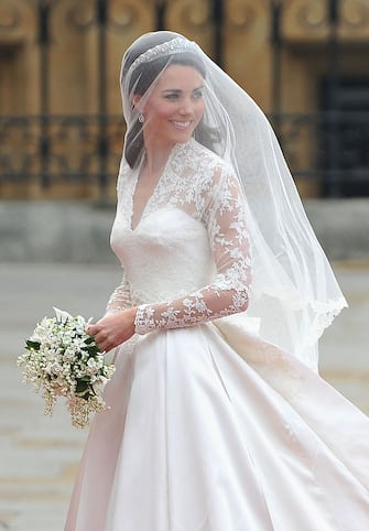 LONDON, ENGLAND - APRIL 29:  Catherine Middleton arrives to attend the Royal Wedding of Prince William to Catherine Middleton at Westminster Abbey on April 29, 2011 in London, England. The marriage of the second in line to the British throne is to be led by the Archbishop of Canterbury and will be attended by 1900 guests, including foreign Royal family members and heads of state. Thousands of well-wishers from around the world have also flocked to London to witness the spectacle and pageantry of the Royal Wedding.  (Photo by Pascal Le Segretain/Getty Images)