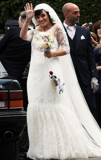 CRANHAM, UNITED KINGDOM - JUNE 11:  Lily Allen and Sam Cooper are wed at St James the Great church on June 11, 2011 in Cranham, Gloucestershire, England.  (Photo by Martin Grimes/FilmMagic)