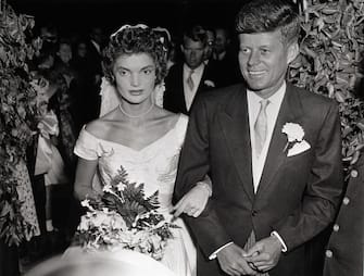 John F. Kennedy and Jacqueline Lee Bouvier wed on September 12, 1953, in St. Mary's Church in Newport, Rhode Island, USA.