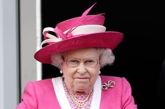 EPSOM, ENGLAND - JUNE 04:  Queen Elizabeth II reacts after her horse Carlton House comes in third in the Epsom Derby at Epsom Downs racecourse on June 4, 2011 in Epsom, England.  Carlton Hall had been the Bookmakers favourite to win the Derby, but lost out to Pour Moi.  (Photo by Matthew Lloyd/Getty Images)