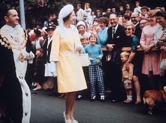 Queen Elizabeth II visits the Town Hall in Sydney with Emmet McDermott (1911 - 2002), Lord Mayor of Sydney, during her tour of Australia, May 1970. She is there in connection with the bicentenary of Captain Cook's 1770 expedition to Australia. (Photo by Keystone/Hulton Archive/Getty Images)