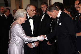 Queen Elizabeth ll shakes hands with Daniel Craig, the new James Bond, at the Royal Premiere for the 21st Bond film 'Casino Royale' at the Odeon in Leicester Square, London on November 14, 2006.
Anwar Hussein/EMPICS Entertainment