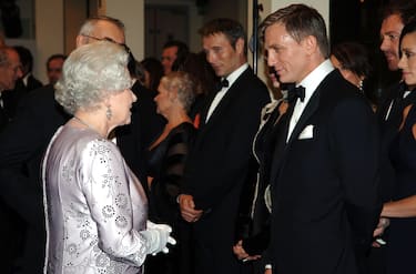 Queen Elizabeth ll shakes chats with Daniel Craig, the new James Bond, at the Royal Premiere for the 21st Bond film 'Casino Royale' at the Odeon in Leicester Square, London on November 14, 2006.
Anwar Hussein/EMPICS Entertainment