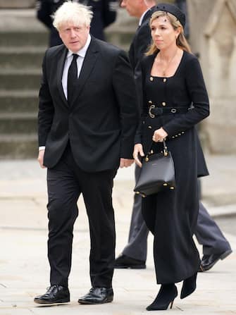 Former prime minister Boris Johnson and his wife Carrie Johnson arriving at the State Funeral of Queen Elizabeth II, held at Westminster Abbey, London. Picture date: Monday September 19, 2022. (Photo by Peter Byrne/PA Images via Getty Images)
