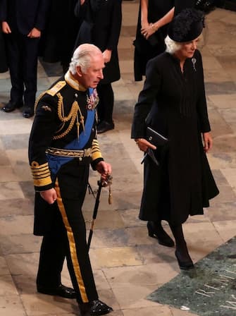 Britain's King Charles III and Britain's Camilla, Queen Consort arrive at Westminster Abbey in London on September 19, 2022, for the State Funeral Service for Britain's Queen Elizabeth II. - Leaders from around the world will attend the state funeral of Queen Elizabeth II. The country's longest-serving monarch, who died aged 96 after 70 years on the throne, will be honoured with a state funeral on Monday morning at Westminster Abbey. (Photo by PHIL NOBLE / POOL / AFP) (Photo by PHIL NOBLE/POOL/AFP via Getty Images)