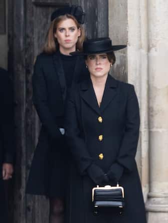 LONDON, ENGLAND - SEPTEMBER 19:  Princess Beatrice of York and Princess Eugenie of York during the State Funeral of Queen Elizabeth II at Westminster Abbey on September 19, 2022 in London, England.  Elizabeth Alexandra Mary Windsor was born in Bruton Street, Mayfair, London on 21 April 1926. She married Prince Philip in 1947 and ascended the throne of the United Kingdom and Commonwealth on 6 February 1952 after the death of her Father, King George VI. Queen Elizabeth II died at Balmoral Castle in Scotland on September 8, 2022, and is succeeded by her eldest son, King Charles III. (Photo by Samir Hussein/WireImage)