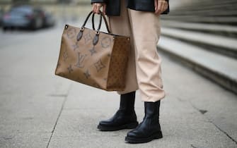 MUNICH, GERMANY - FEBRUARY 13: Christina Biluca wearing & other stories boots, Edited pants, Louis Vuitton bag and Zara leather blazer on February 13, 2020 in Munich, Germany. (Photo by Jeremy Moeller/Getty Images)
