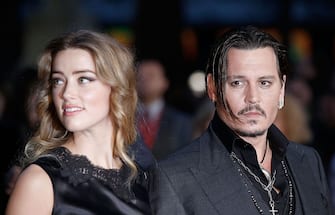 LONDON, ENGLAND - OCTOBER 11:  Amber Heard and Johnny Depp attend the "Black Mass" Virgin Atlantic Gala screening during the BFI London Film Festival, at Odeon Leicester Square on October 11, 2015 in London, England.  (Photo by John Phillips/Getty Images for BFI)