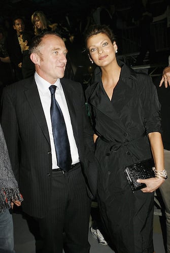 PARIS - OCTOBER 7:   Francois Henri Pinault and Linda Evangelista watches the Alexander McQueen show as part of Paris Fashion Week (Pret-a-Porter) Spring/Summer 2006 on October 7, 2005 in Paris, France. (Photo by Michel Dufour/WireImage)