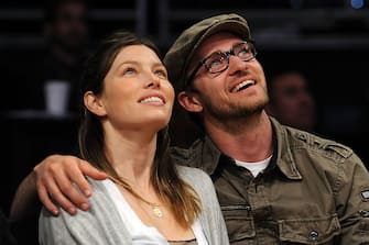 LOS ANGELES, CA - APRIL 21:  Actors Jessica Biel and Justin Timberlake smile from their courtside seats during the Los Angeles Lakers and the Utah Jazz Game Two of the Western Conference Quarterfinals during the 2009 NBA Playoffs at Staples Center on April 21, 2009 in Los Angeles, California. NOTE TO USER: User expressly acknowledges and agrees that, by downloading and or using this photograph, User is consenting to the terms and conditions of the Getty Images License Agreement.  (Photo by Lisa Blumenfeld/Getty Images)