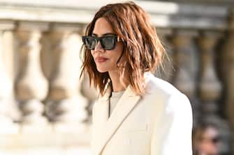 PARIS, FRANCE - OCTOBER 04: Christine Centenera is seen wearing a white jacket and black and gold Louis Vuitton sunglasses outside the Louis Vuitton show during Paris Fashion Week S/S 2023 on October 04, 2022 in Paris, France. (Photo by Daniel Zuchnik/Getty Images)