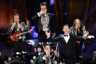 SANREMO, ITALY - FEBRUARY 15:  Elio e le storie tese and Rocco Siffredi attend the fourth night of the 63rd Sanremo Song Festival at the Ariston Theatre on February 15, 2013 in Sanremo, Italy.  (Photo by Venturelli/WireImage)