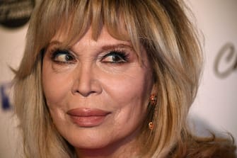 French artist Amanda Lear poses as she arrives for the 26th Film Francais trophies ceremony at the Palais Brongniart in Paris, on February 5, 2019. (Photo by Anne-Christine POUJOULAT / AFP)        (Photo credit should read ANNE-CHRISTINE POUJOULAT/AFP via Getty Images)
