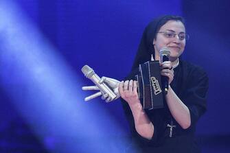 Sister Cristina Scuccia reacts after winning  the Italian State RAI TV program's final "The Voice of Italy", in Milan on June 6, 2014. The 25-year-old nun Cristina won the talent show thanks to her habit-clad performances but also by having  on her side the critics, who say her popularity stems from novelty value.  AFP PHOTO/Marco BERTORELLO        (Photo credit should read MARCO BERTORELLO/AFP via Getty Images)
