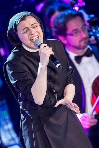 Sister Cristina Scuccia, winner of this year Voice of Italy performs during the annual Vatican Christmas Concert at Rome's Auditorium della Conciliazione in Rome.The Vatican's annual Christmas concert is held in Rome since 1993.The program also featured DJ Bob Sinclar and Patty Smith. (Photo by Alessandra Benedetti/Corbis via Getty Images)