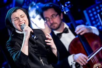 Sister Cristina Scuccia, winner of this year Voice of Italy performs during the annual Vatican Christmas Concert at Rome's Auditorium della Conciliazione in Rome.The Vatican's annual Christmas concert is held in Rome since 1993.The program also featured DJ Bob Sinclar and Patty Smith. (Photo by Alessandra Benedetti/Corbis via Getty Images)