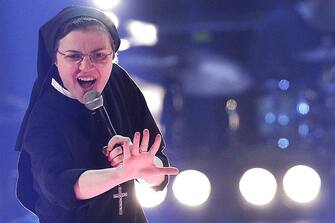 Sister Cristina Scuccia performs during the Italian State RAI TV show final "The Voice of Italy" in Milan on June 5, 2014. The 25-year-old nun is already a talent show sensation thanks to her habit-clad performances but also has on her side the critics, who say her popularity stems from novelty value.  AFP PHOTO / MARCO BERTORELLO        (Photo credit should read MARCO BERTORELLO/AFP via Getty Images)