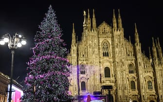 A moment of the Christmas tree lighting ceremony in Piazza Duomo in Milan, Italy, 06 December 2022.   ANSA/MATTEO CORNER