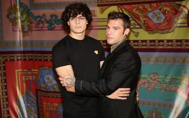 MILAN, ITALY - SEPTEMBER 24: Luis Sal and Fedez are seen on the front row of the Versace fashion show during the Milan Fashion Week - Spring / Summer 2022 on September 24, 2021 in Milan, Italy. (Photo by Vittorio Zunino Celotto/Getty Images)