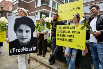 THE HAGUE, NETHERLANDS - MAY 31: Human Rights activists attend the birthday party of jailed Iranian Human Rights lawyer Nasrin Sotoudeh, outside the embassy of the Islamic Republic of Iran on May 31, 2019 in The Hague, Netherlands. Nasrin Sotoudeh has been sentenced in March to 38 years in prison and 148 lashes for protesting the death penalty and against the obligation to wear a headscarf. The birthday party organized by Amnesty International is a protest for her release. (Photo by Pierre Crom/Getty Images)