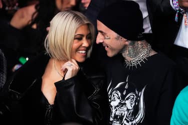 LAS VEGAS, NEVADA - MARCH 04: Kourtney Kardashian and Travis Barker attend the UFC 285 event at T-Mobile Arena on March 04, 2023 in Las Vegas, Nevada.  (Photo by Jeff Bottari/Zuffa LLC via Getty Images)