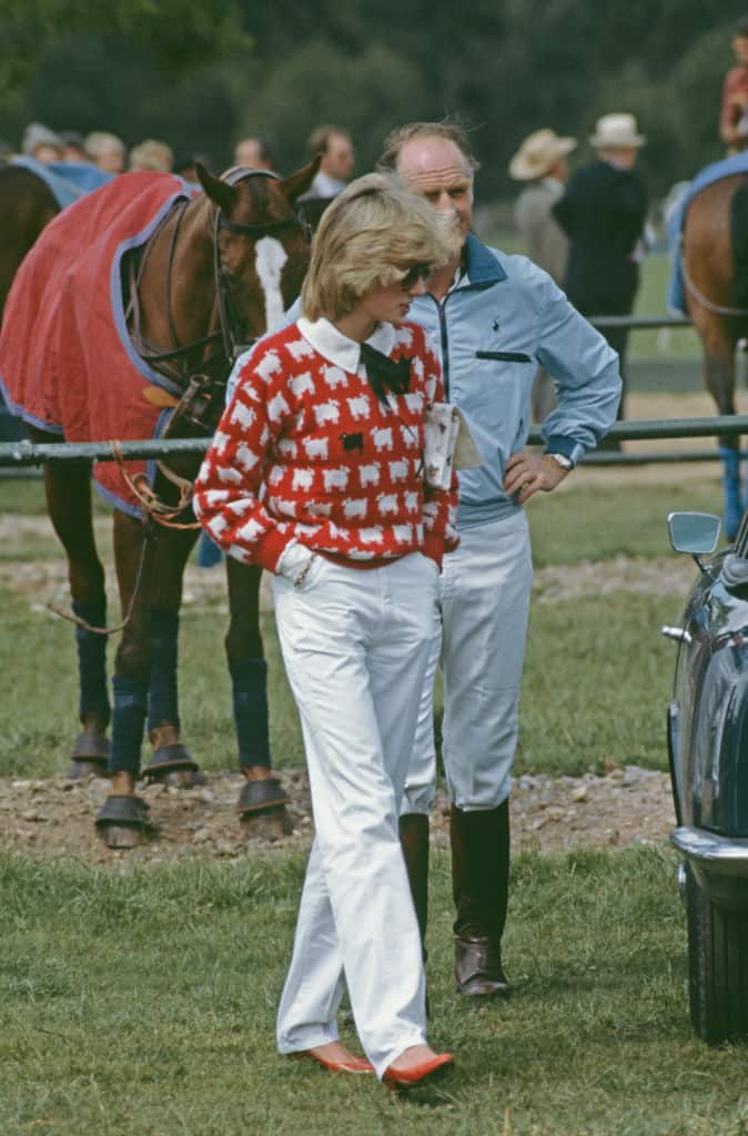 Diana, Princess of Wales  (1961 - 1997) with Major Ronald Ferguson (1931 - 2003) at a polo match at Smith's Lawn, Guards Polo Club, Windsor, June 1983. Diana is wearing a Muir and Osborne 'black sheep' sweater. (Photo by Princess Diana Archive/Getty Images)
