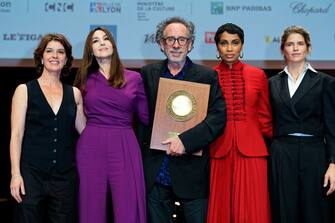LYON, FRANCE - OCTOBER 21: Irene Jacob, Monica Bellucci, Tim Burton, Imany and Alice Taglioni attend the Lumiere Award ceremony during the 14th Film Festival Lumiere on October 21, 2022 in Lyon, France.  (Photo by Sylvain Lefevre/Getty Images)