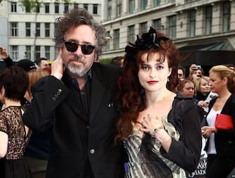 LONDON, UNITED KINGDOM - MAY 09: Tim Burton and Helena Bonham-Carter attend the European premiere of Dark Shadows at Empire Leicester Square on May 9, 2012 in London, England.  (Photo by Fred Duval/FilmMagic)