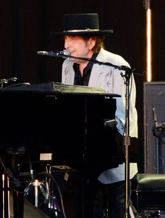1162177229 LONDON, ENGLAND - JULY 12: Bob Dylan performs on stage in Hyde Park on July 12, 2019 in London, England. (Photo by Matthew Baker/Getty Images)