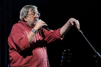 135280903 BOLOGNA, ITALY - DECEMBER 03: Italian musician and author Francesco Guccini performs at Unipol Arena on December 3, 2011 in Bologna, Italy. (Photo by Roberto Serra - Iguana Press/Getty Images)