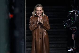 Miu Miu Italian fashion designer Miuccia Bianchi Prada acknowledges the audience at the end of her show as part of the Paris Fashion Week Womenswear Spring/Summer 2024 in Paris on October 3, 2023. (Photo by JULIEN DE ROSA / AFP) (Photo by JULIEN DE ROSA/AFP via Getty Images)