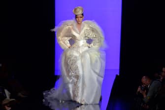 Chinese model Liu Wen presents a creation by Jean Paul Gaultier during the Haute Couture Fall-Winter 2013/2014 collection show, on July 3, 2013 in Paris.  AFP PHOTO/MIGUEL MEDINA        (Photo credit should read MIGUEL MEDINA/AFP via Getty Images)