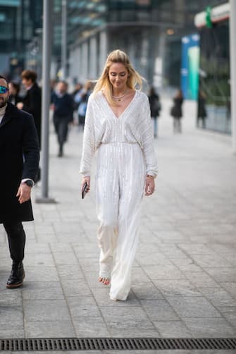 MILAN, ITALY - FEBRUARY 20: Chiara Ferragni is seen weairng white striped overall outside Alberta Ferretti on Day 1 Milan Fashion Week Autumn/Winter 2019/20 on February 20, 2019 in Milan, Italy. (Photo by Christian Vierig/Getty Images)