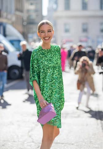 MILAN, ITALY - FEBRUARY 26: Leonie Hanne seen weairng green glitter dress, pink bag, heels outside Ermanno Scervino fashion show during the Milan Fashion Week Fall/Winter 2022/2023 on February 26, 2022 in Milan, Italy. (Photo by Christian Vierig/Getty Images)