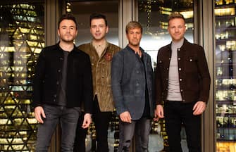 LONDON, ENGLAND - NOVEMBER 05: Westlife (L-R) Shane Filan, Mark Feehily, Kian Egan and Nicky Bryne attend an intimate evening with Westlife, hosted by Vernon Kay, at the Pan Pacific London   on November 05, 2021 in London, England. (Photo by Samir Hussein/WireImage)