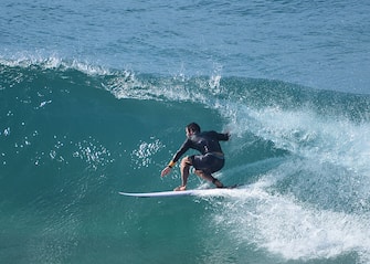 BYRON BAY, NSW - APRIL 28:  Chris Hemsworth surfs on April 28, 2016 in Byron Bay, Australia.  (Photo by Matrix/GC Images)