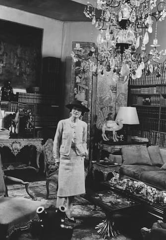 Portrait of French fashion designer Coco Chanel (1883 - 1971) in her home (at 31 Rue Cambon), Paris, France, circa 1950s. (Photo by Rapho Agence/Photo Researchers History/Getty Images)