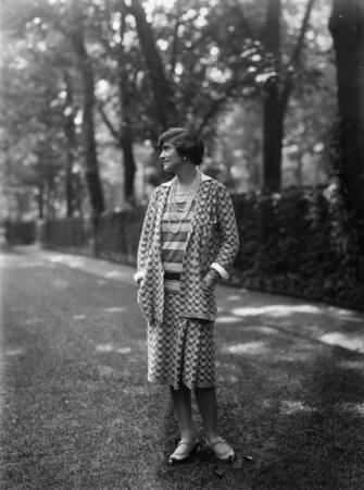 30th May 1929:  Designer Gabrielle 'Coco' Chanel (1883 - 1971), wearing one of her suits in the grounds at Fauborg, St Honore, Paris.  (Photo by Sasha/Hulton Archive/Getty Images)