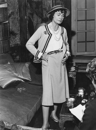 French fashion designer Coco Chanel (1883 - 1971) in her apartment at the Hotel Ritz Paris, 1960. (Photo by Archive Photos / Getty Images)