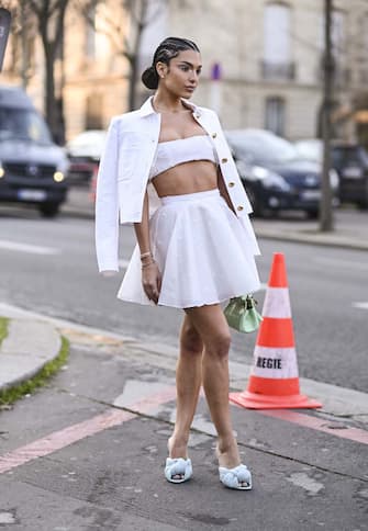 PARIS, FRANCE - MARCH 07: Jessica Verratti is seen wearing a white Giambatista Valli outfit and green Giambatista Valli bag outside the Giambatista Valli show during Paris Fashion Week A/W 2022 on March 07, 2022 in Paris, France. (Photo by Daniel Zuchnik/Getty Images)