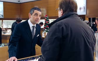 UK. Rowan Atkinson in a scene from the ©Universal Pictures movie : Love Actually (2003). 
Plot: Follows the lives of eight very different couples in dealing with their love lives in various loosely interrelated tales all set during a frantic month before Christmas in London, England. 
Ref:  LMK110-J6851-121020
Supplied by LMKMEDIA. Editorial Only.
Landmark Media is not the copyright owner of these Film or TV stills but provides a service only for recognised Media outlets. pictures@lmkmedia.com
