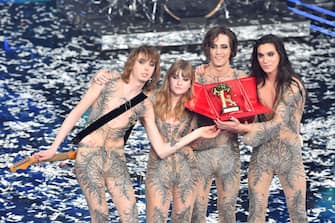 SANREMO, ITALY - MARCH 06:  Maneskin band celebrates on stage during the 71th Sanremo Music Festival 2021 at Teatro Ariston on March 06, 2021 in Sanremo, Italy. (Photo by Jacopo M. Raule/Getty Images)
