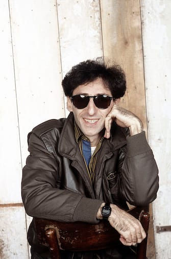 Italian singer-songwriter and director Franco Battiato smiling wearing sunglasses. 1984. (Photo by Angelo Deligio/Mondadori via Getty Images)