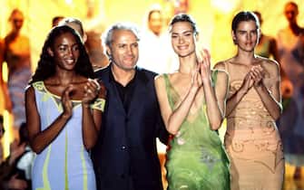 PARIS, FRANCE - JANUARY: Naomi Campbell, Gianni Versace and Stella Tennant walks the runway at the Versace Haute Couture Spring/Summer 1996 fashion show during the Paris Fashion Week in January, 1996 in Paris, France. (Photo by Victor VIRGILE/Gamma-Rapho via Getty Images)